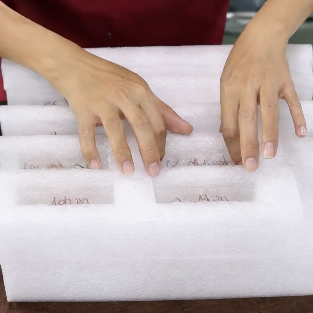 Custom electronic coils arranged in protective foam packaging